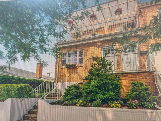 front view of a house with a street