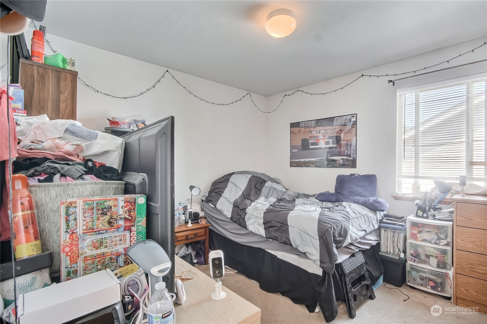 19910 142nd Place Southeast Renton, WA 98058 - Photo 22 of 38 a bedroom with furniture and a baby crib