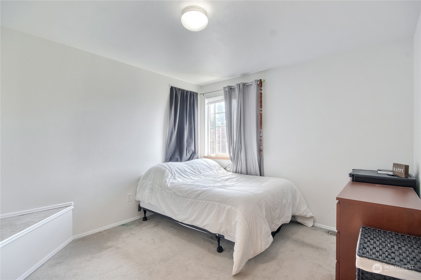 19910 142nd Place Southeast Renton, WA 98058 - Photo 23 of 38 a bedroom with a bed and a window