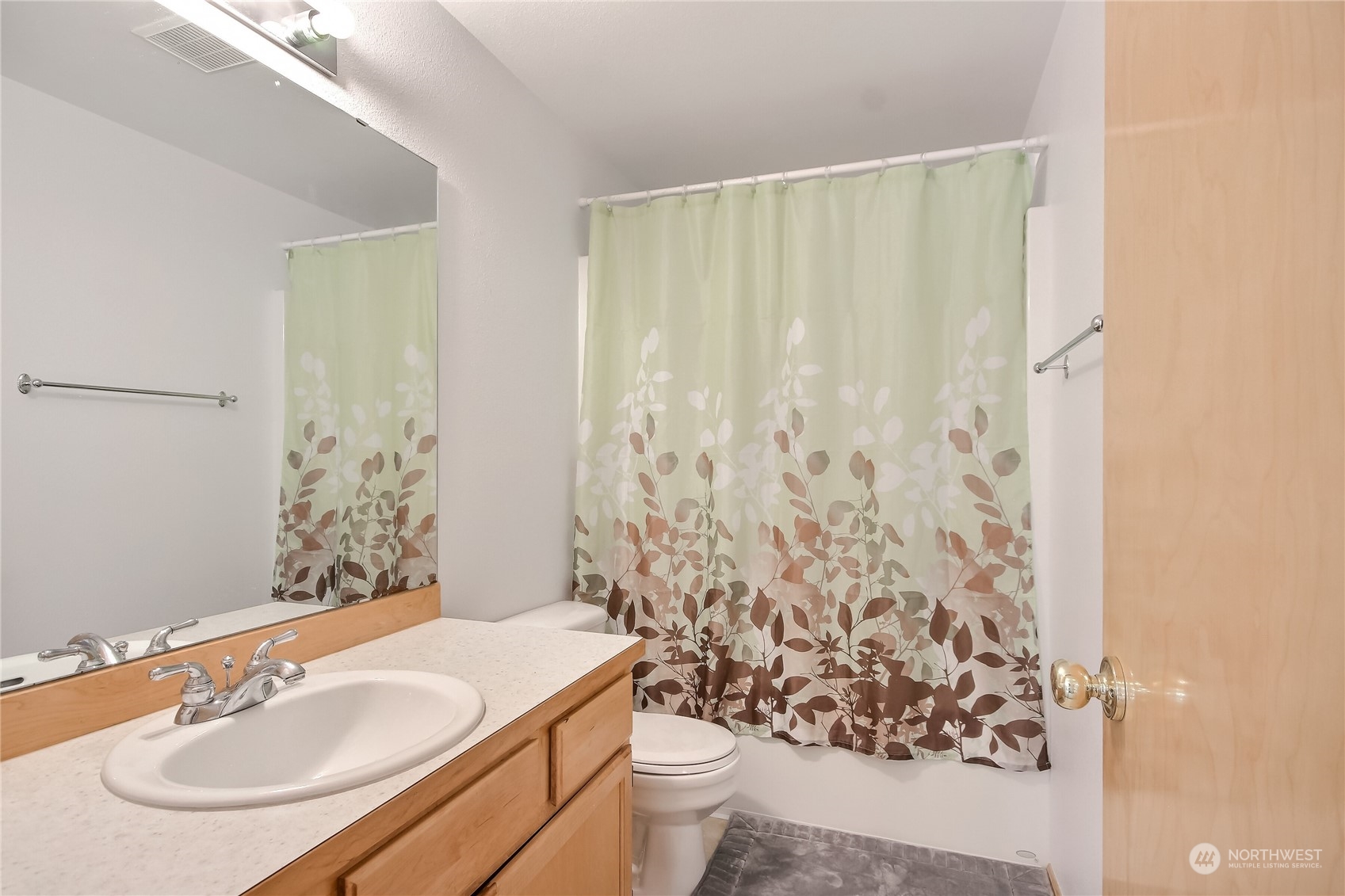 19910 142nd Place Southeast Renton, WA 98058 - Photo 25 of 38 a bathroom with a sink toilet and shower