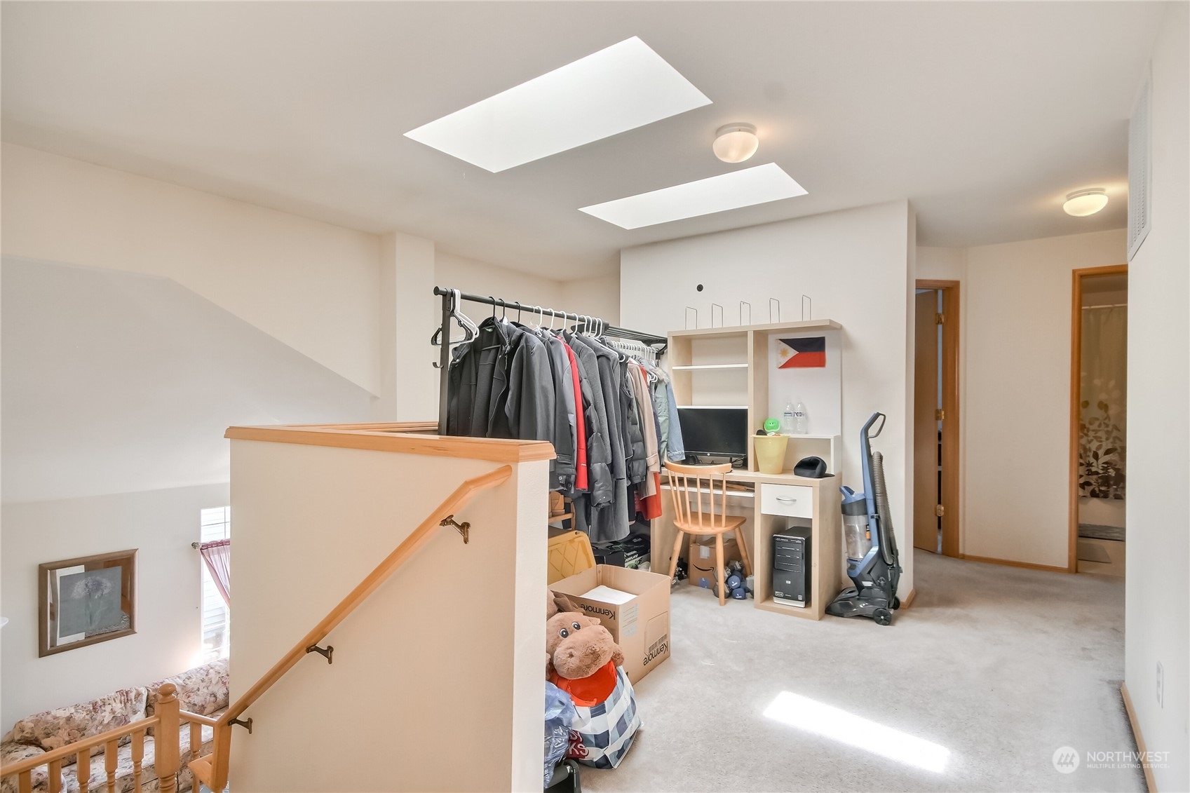 19910 142nd Place Southeast Renton, WA 98058 - Photo 26 of 38 a view of living room with furniture and white walls