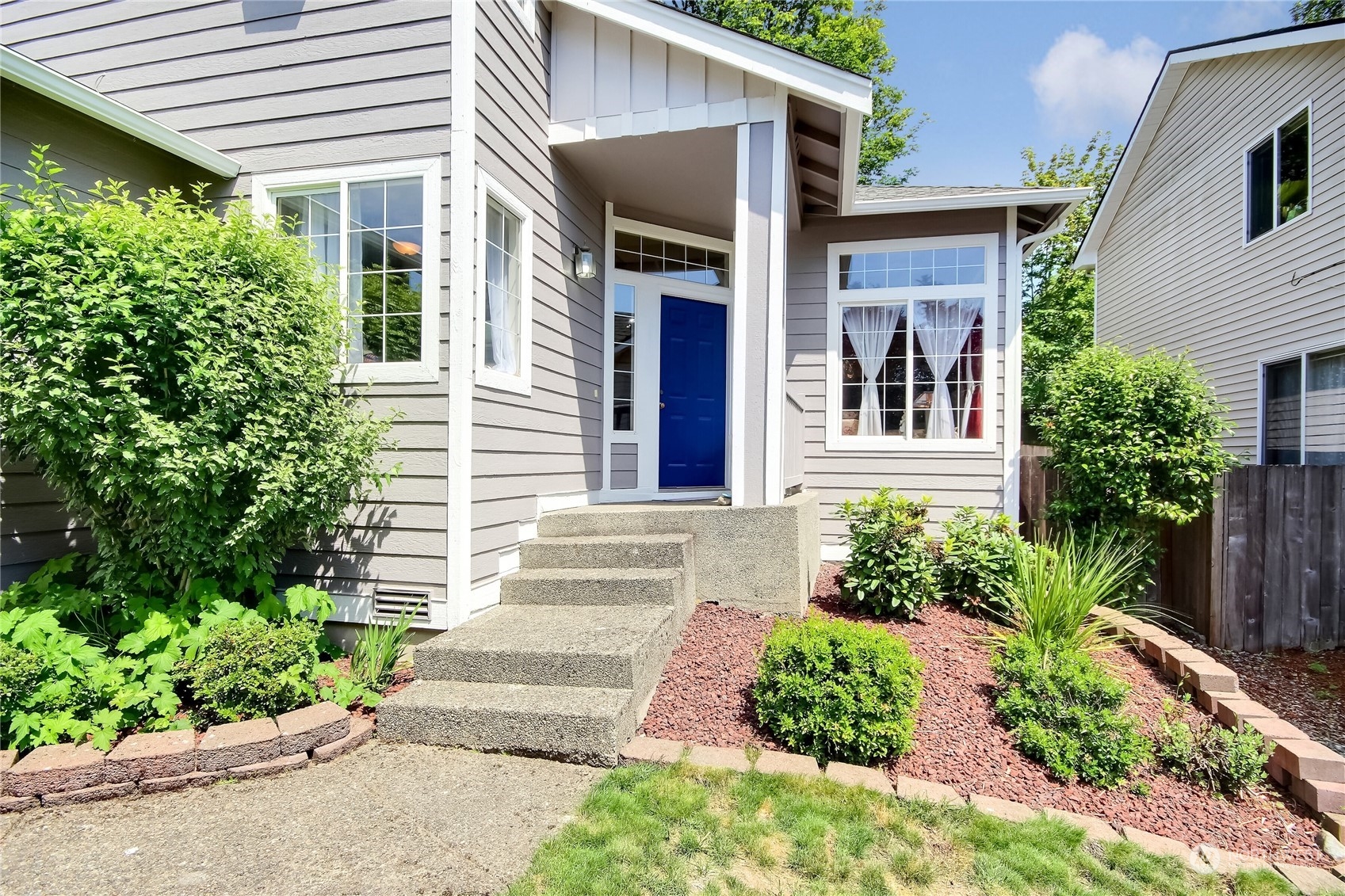 19910 142nd Place Southeast Renton, WA 98058 - Photo 5 of 38 front view of a house with a yard