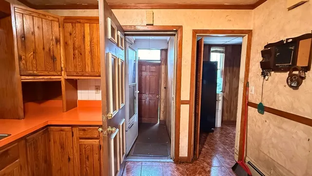 a kitchen with stainless steel appliances a stove sink and cabinets