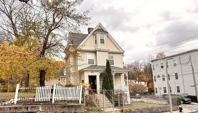 front view of a house with a street