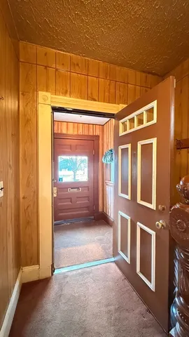 a view of a entryway with stairs