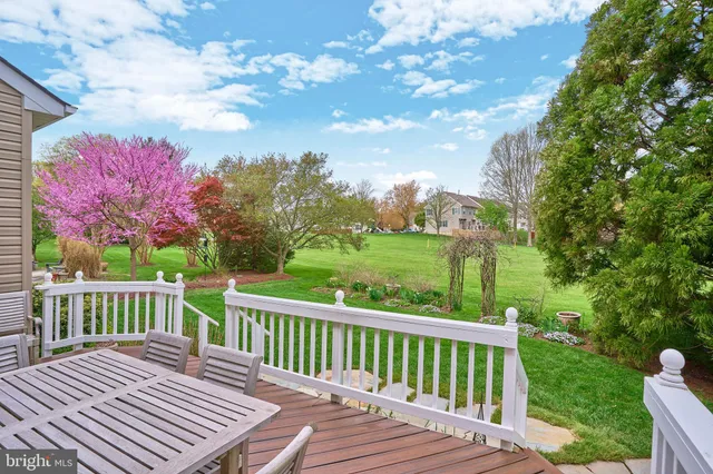 a bedroom with a bed and a table in it