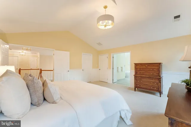 a view of a house with a flower garden