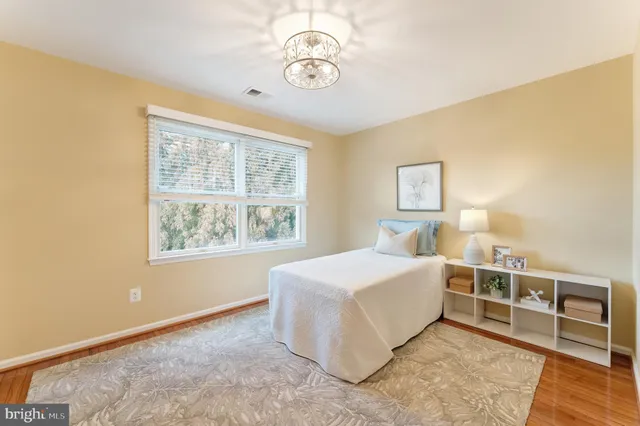 a view of a big yard with lots of green space