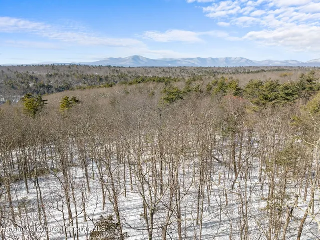 a view of snow on a yard