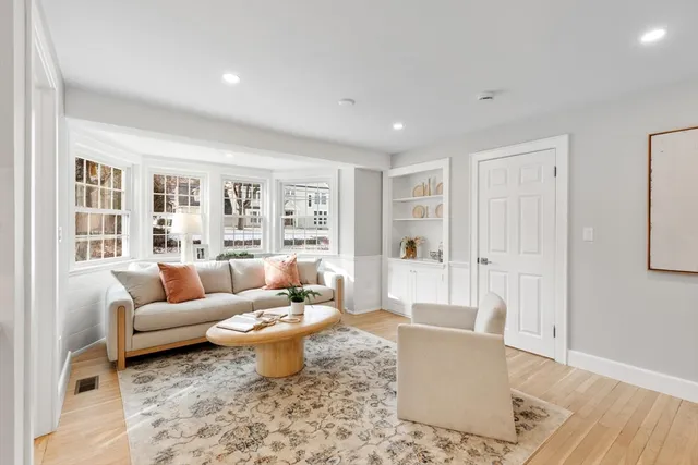 a living room with furniture and a couch