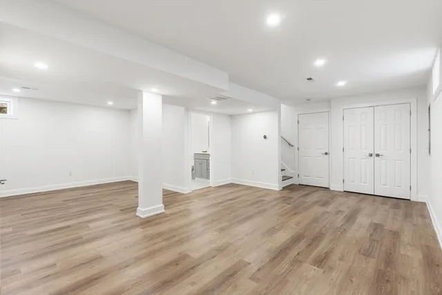 a view of a house with snow on the road