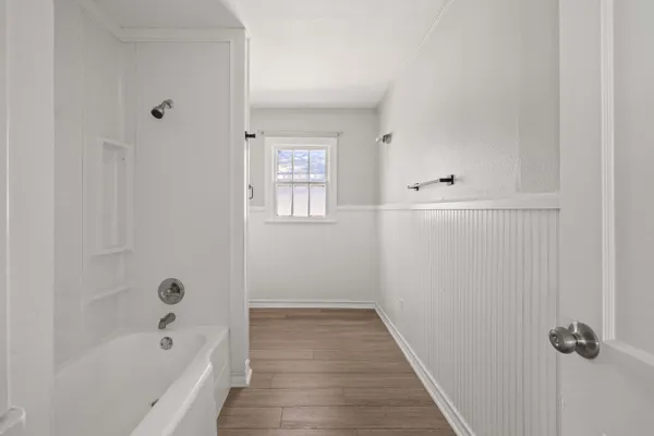 a bathroom with a toilet and a sink