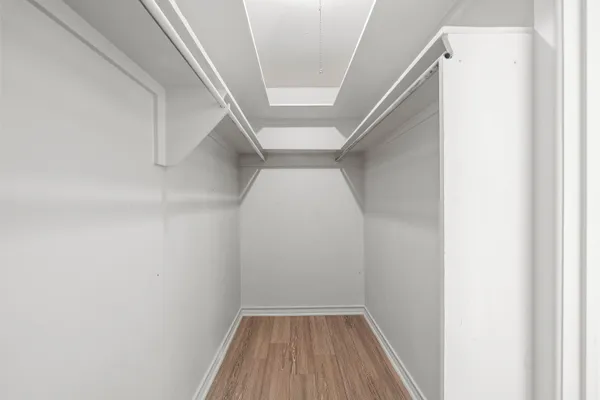 a utility room with sink dryer and washer