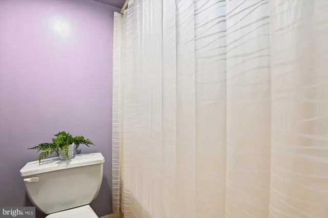 a bathroom with a toilet