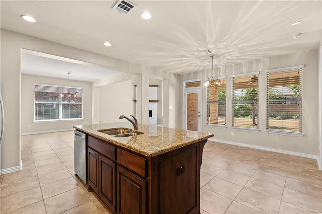 a kitchen with a counter space cabinets and a sink
