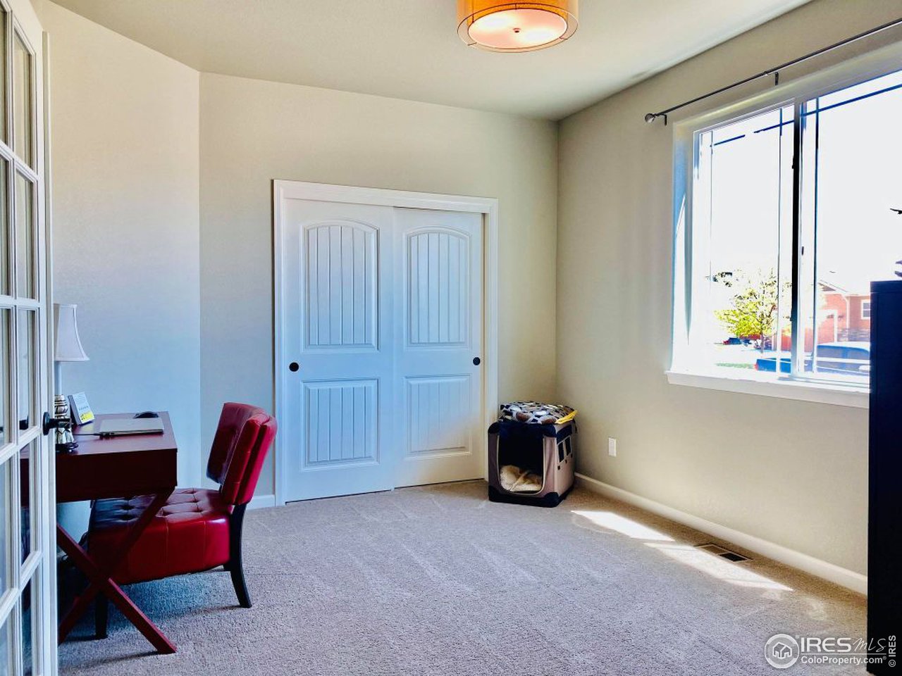 505 Deville Drive Greeley, CO 80634 - Photo 27 of 39 a view of workspace with furniture and window