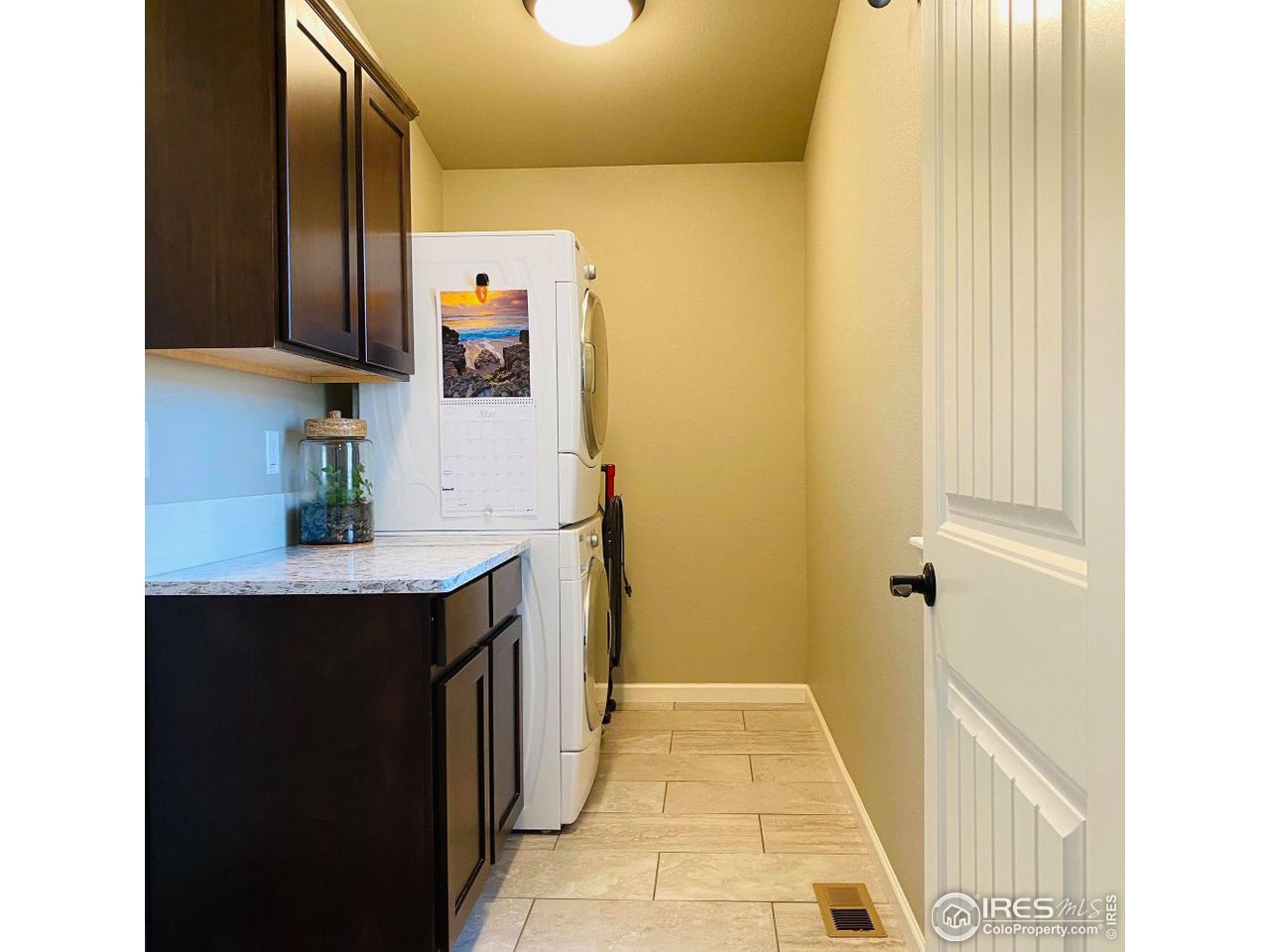 505 Deville Drive Greeley, CO 80634 - Photo 32 of 39 a bathroom with a sink and a mirror
