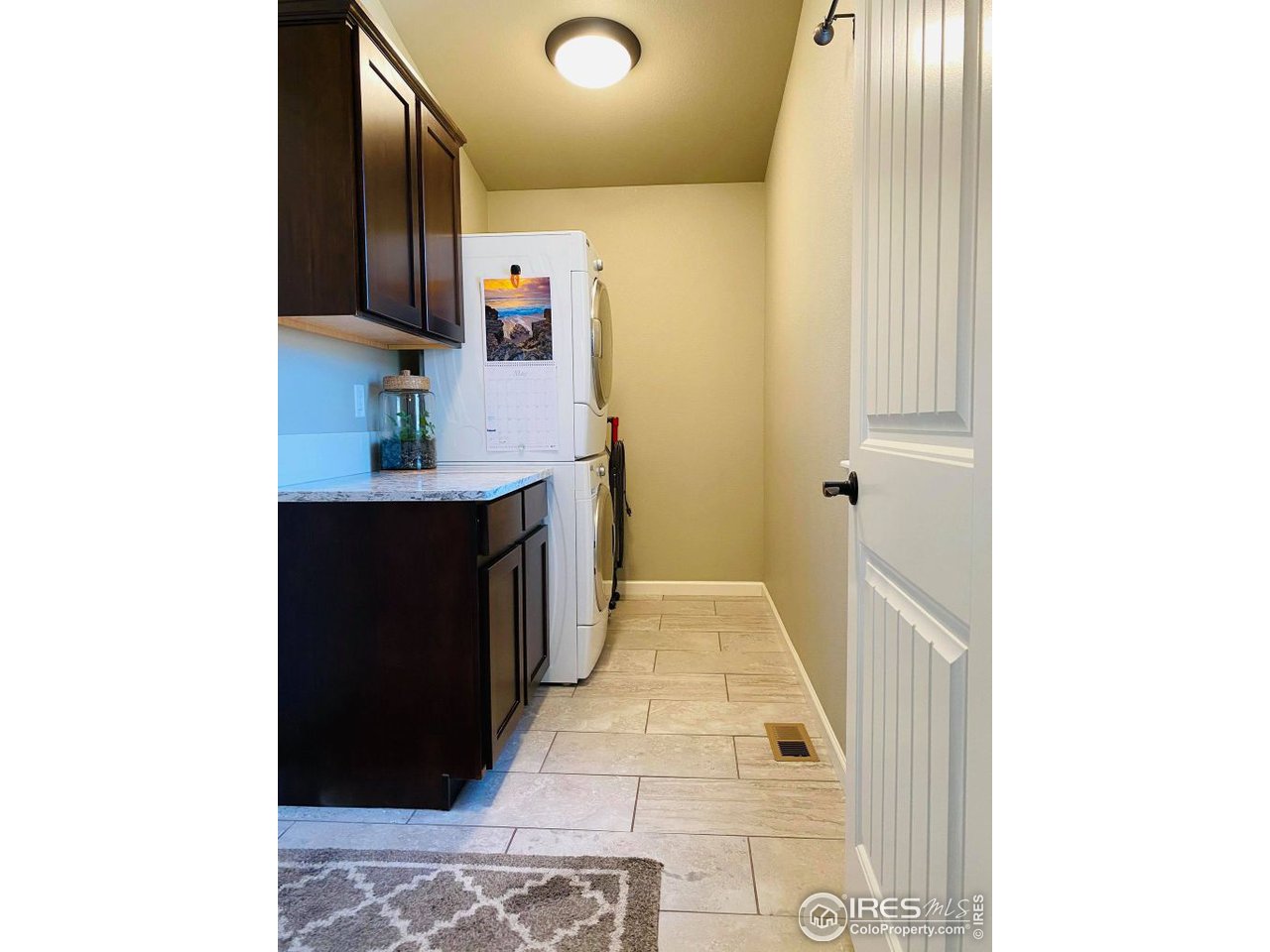 505 Deville Drive Greeley, CO 80634 - Photo 33 of 39 a bathroom with a sink a toilet and mirror
