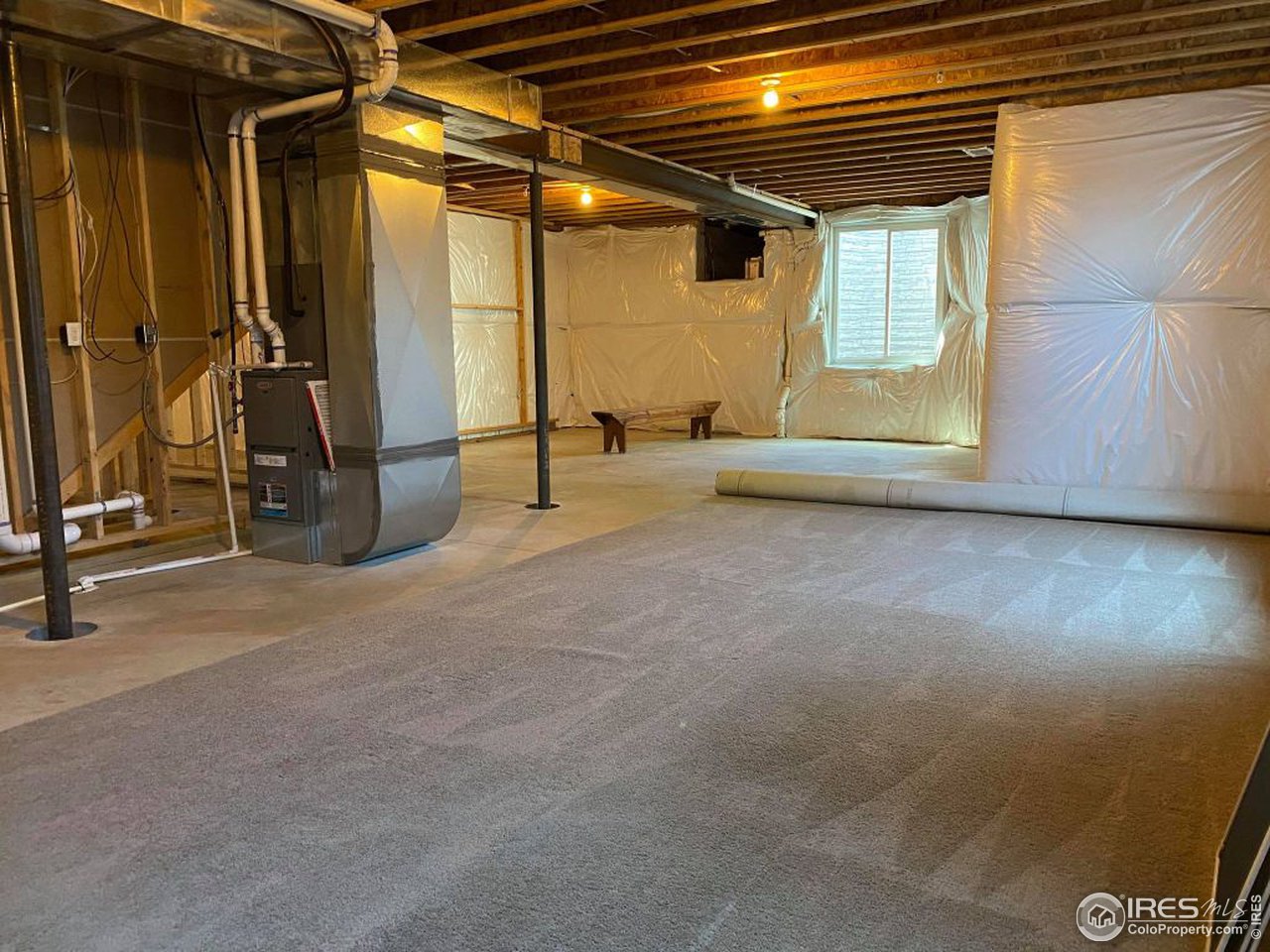 505 Deville Drive Greeley, CO 80634 - Photo 35 of 39 a view of an empty room with a fireplace