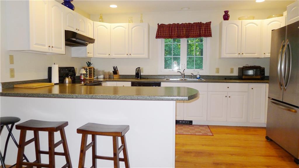 117 Old Lewiston Road Monmouth, ME 04265 - Photo 4 of 33 Bright kitchen with lots of storage.
