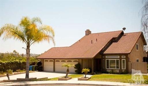 823 Warren Court Moorpark, CA 93021 - Photo 1 of 20 a house with palm tree in front of it