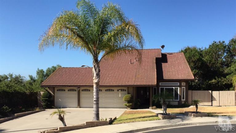 823 Warren Court Moorpark, CA 93021 - Photo 2 of 20 a house that has a tree in front of it