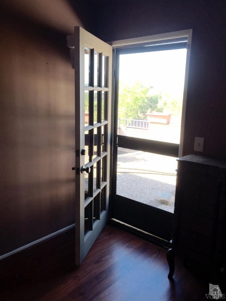 823 Warren Court Moorpark, CA 93021 - Photo 12 of 20 a view of room with window and hardwood floor