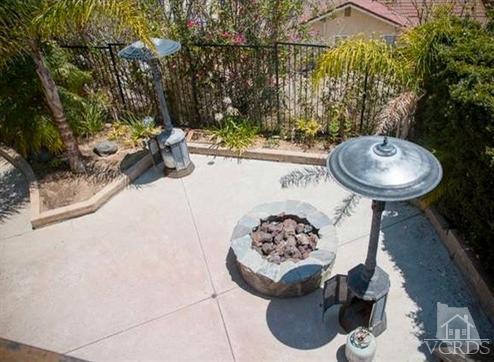 823 Warren Court Moorpark, CA 93021 - Photo 18 of 20 a view of a chairs and table in the patio