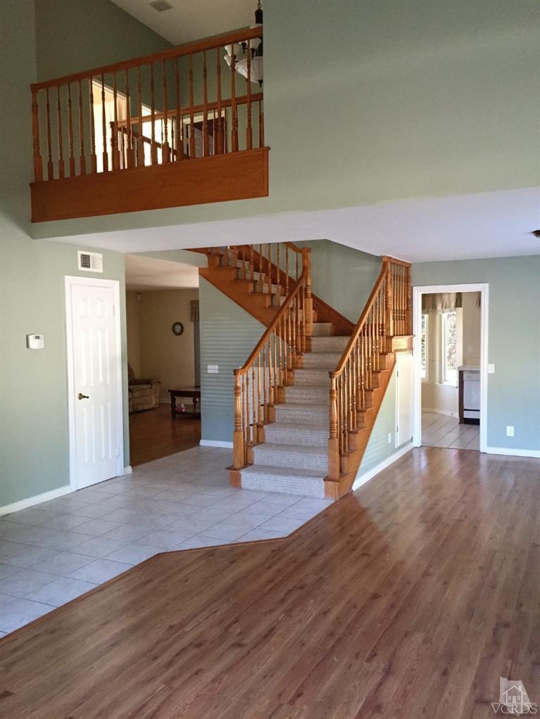 823 Warren Court Moorpark, CA 93021 - Photo 3 of 20 a view of an entryway with wooden floor