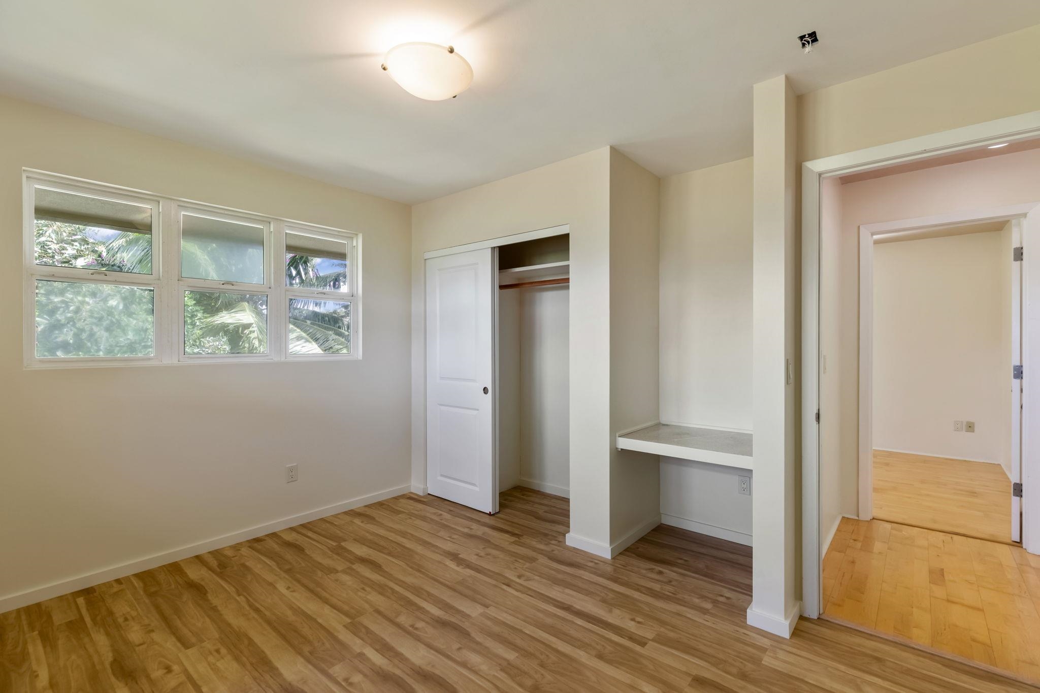 44 Pokoa Place Haiku, HI 96708 - Photo 15 of 29 a view of empty room with wooden floor