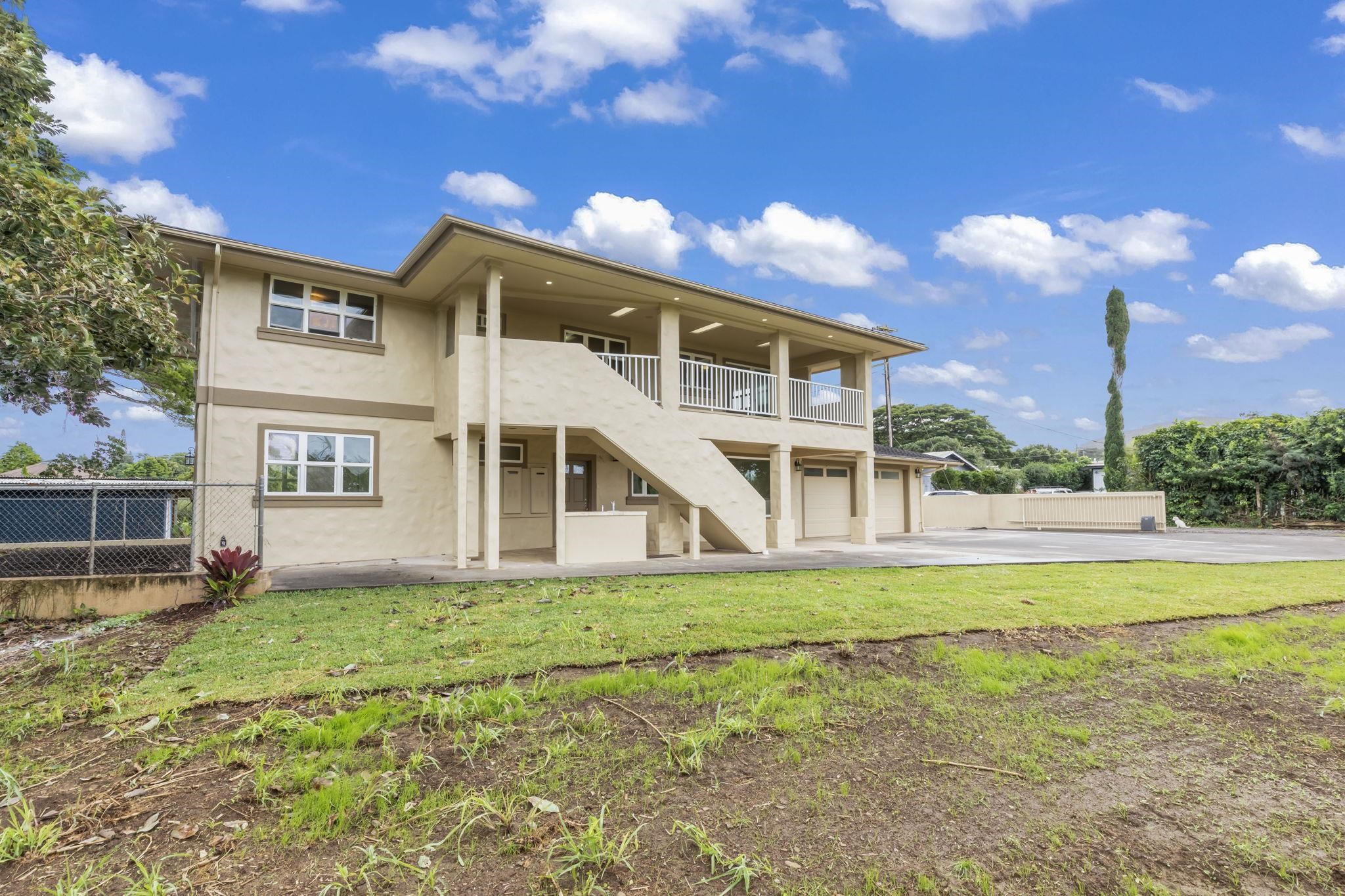 44 Pokoa Place Haiku, HI 96708 - Photo 23 of 29 a view of a house with a yard