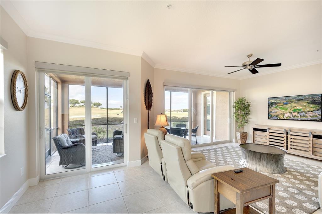 7482 Divot Loop, Unit 6A Bradenton, FL 34202 - Photo 21 of 33 a living room with furniture and a window