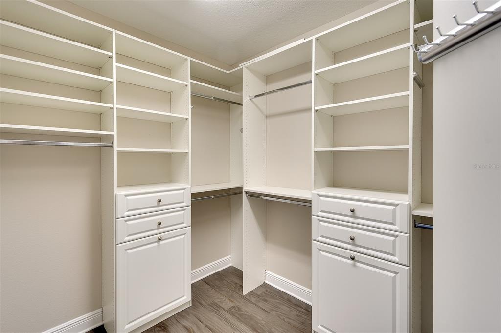 7482 Divot Loop, Unit 6A Bradenton, FL 34202 - Photo 25 of 33 a view of walk in closet with empty racks