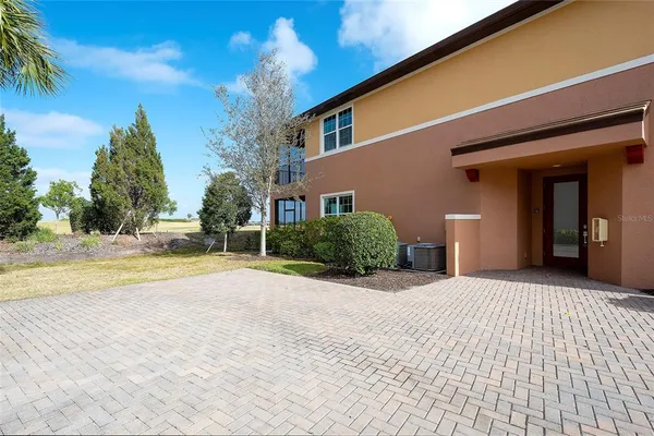 a view of a house with a swimming pool