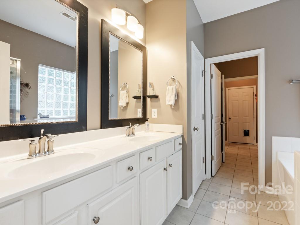 392 Sand Paver Way Fort Mill, SC 29708 - Photo 13 of 35 a bathroom with a sink and a mirror