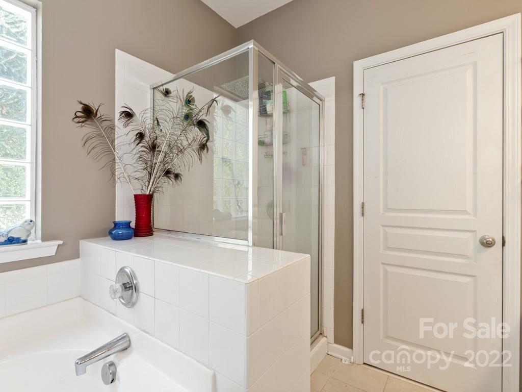 392 Sand Paver Way Fort Mill, SC 29708 - Photo 14 of 35 a bathroom with a tub and a sink