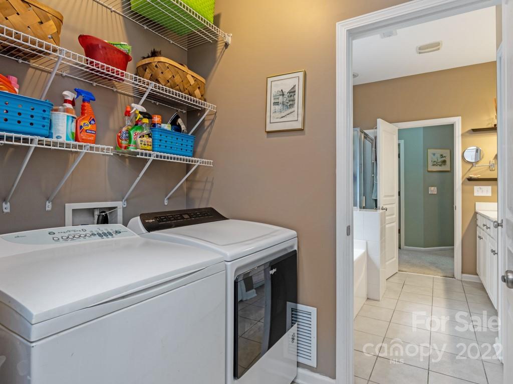 392 Sand Paver Way Fort Mill, SC 29708 - Photo 15 of 35 a utility room with dryer and washer