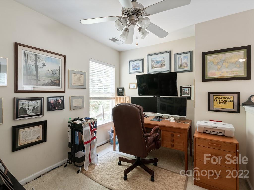 392 Sand Paver Way Fort Mill, SC 29708 - Photo 20 of 35 a view of a workspace with furniture and a window