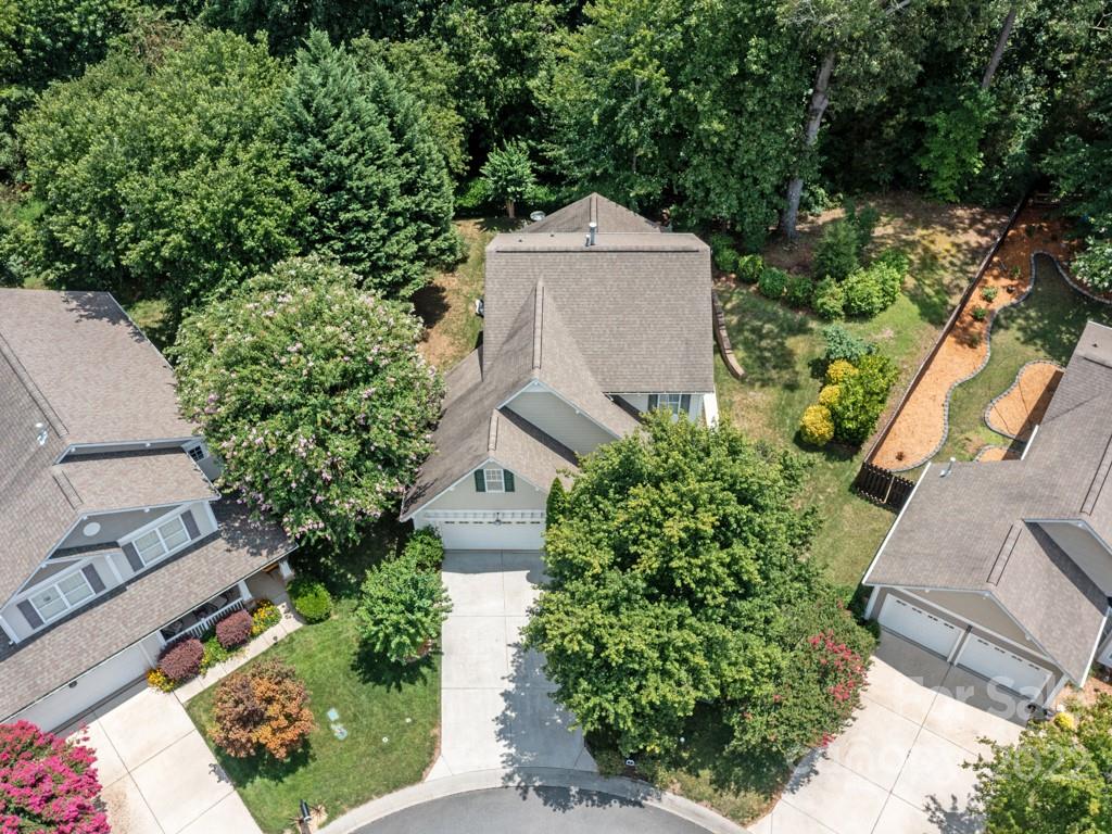 392 Sand Paver Way Fort Mill, SC 29708 - Photo 33 of 35 an aerial view of a house with a yard and garden