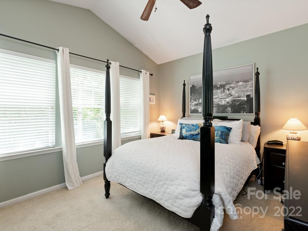 392 Sand Paver Way Fort Mill, SC 29708 - Photo 10 of 35 a bedroom with a bed a lamp and window