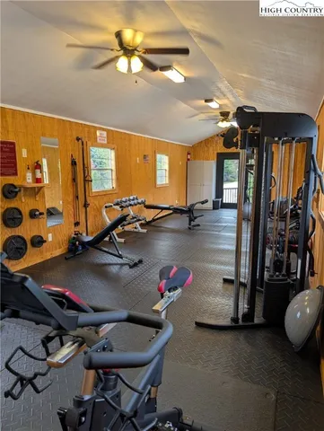 a view of a living room with kitchen countertops