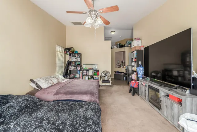 a very nice looking room with a large mirror and sink