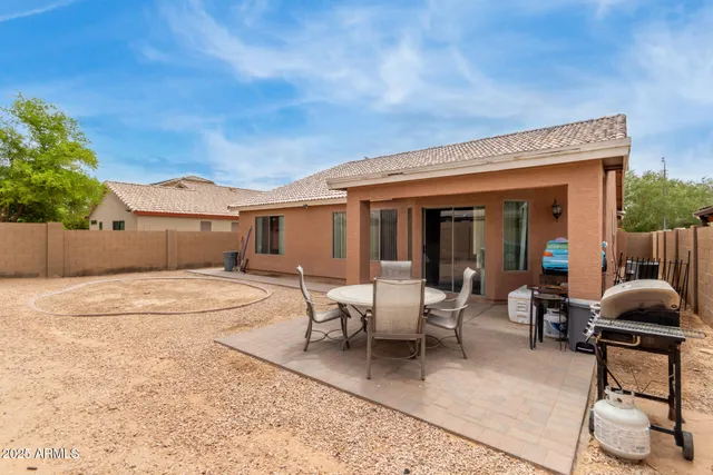 swimming pool view with a outdoor seating