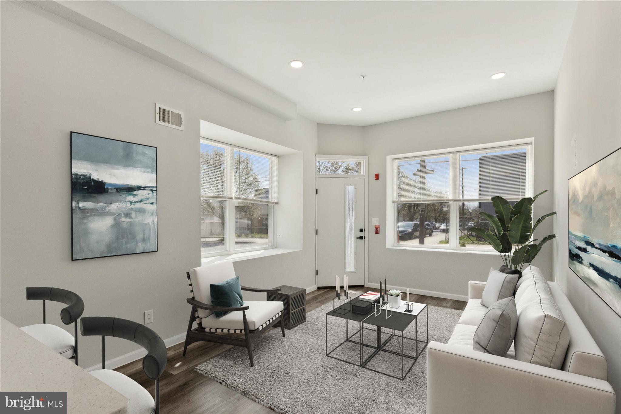 623 West Oxford Street Philadelphia, PA 19122 - Photo 20 of 26 a living room with furniture and a flat screen tv
