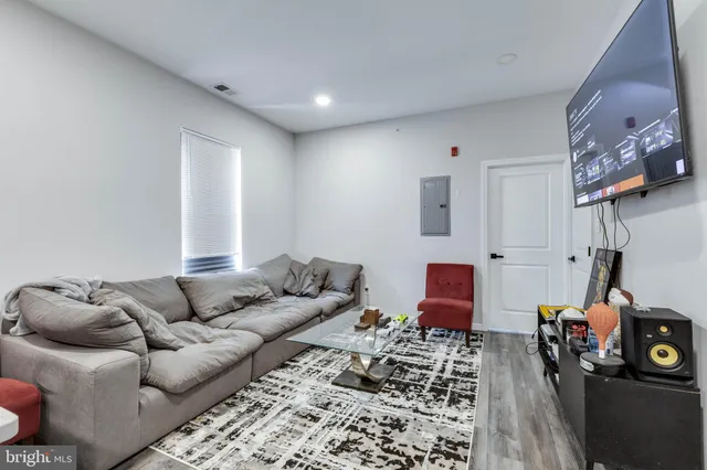 a living room with furniture and a couch
