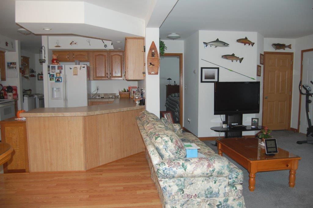 85 Stanley Road Readfield, ME 04355 - Photo 6 of 28 LIVING ROOM INTO KITCHEN