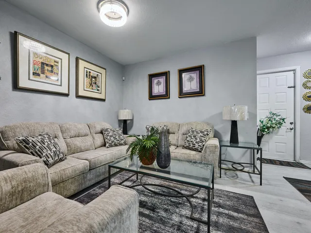 a bathroom with a toilet sink and shower
