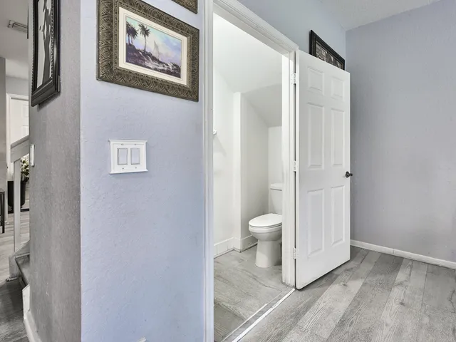 a kitchen with a sink stove and microwave