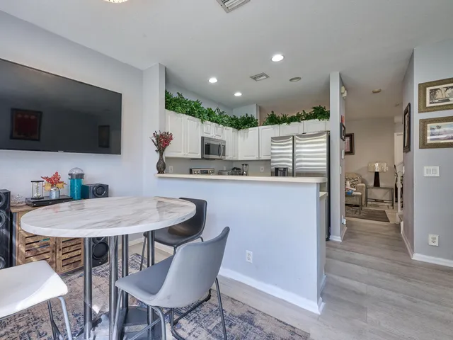 a bed room with a bed and a television