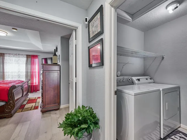 a room with a bed and a window